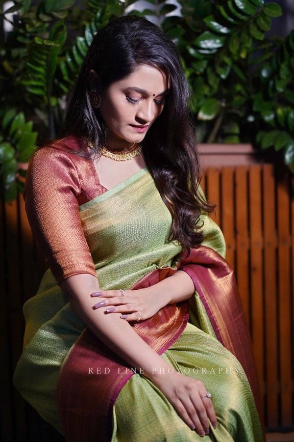 Pista Green Banarasi Soft Silk Saree with Maroon Border and Copper Zari Woven Body  in Surat