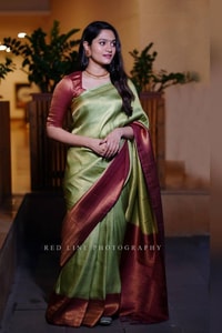 Pista Green Banarasi Soft Silk Saree with Maroon Border and Copper Zari Woven Body  in Surat