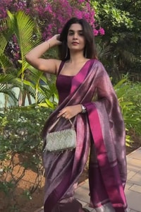 Plum Magenta Shimmer Banarasi Soft Silk Saree with Silver Zari Border and Tissue-Look Pallu  in Surat