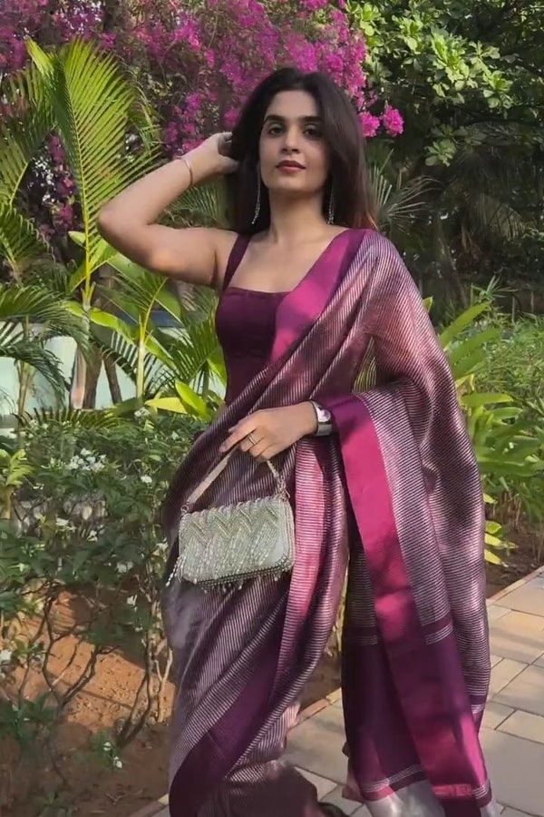 Plum Magenta Shimmer Banarasi Soft Silk Saree with Silver Zari Border and Tissue-Look Pallu  in Surat