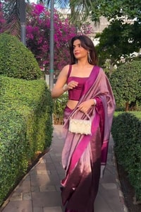 Plum Magenta Shimmer Banarasi Soft Silk Saree with Silver Zari Border and Tissue-Look Pallu  in Surat