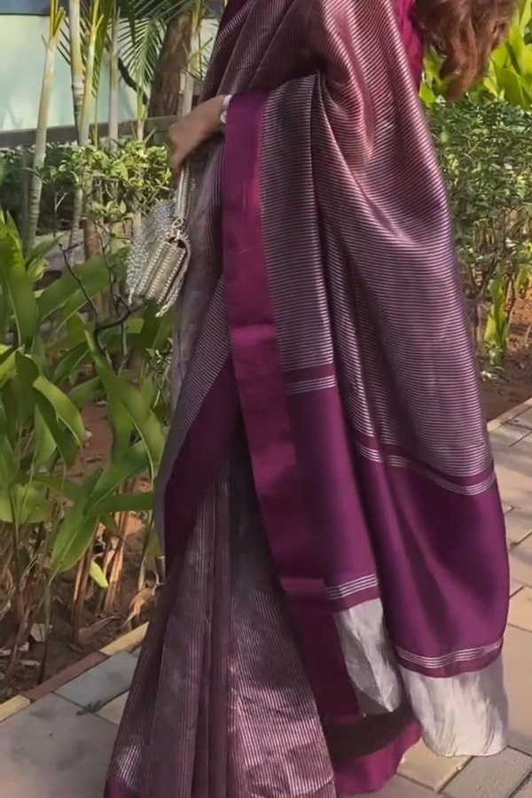 Plum Magenta Shimmer Banarasi Soft Silk Saree with Silver Zari Border and Tissue-Look Pallu  in Surat