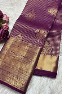 Plum Purple Banarasi Soft Silk Saree with Fine Zari Texture, Gold Buttas and Wide Border  in Surat