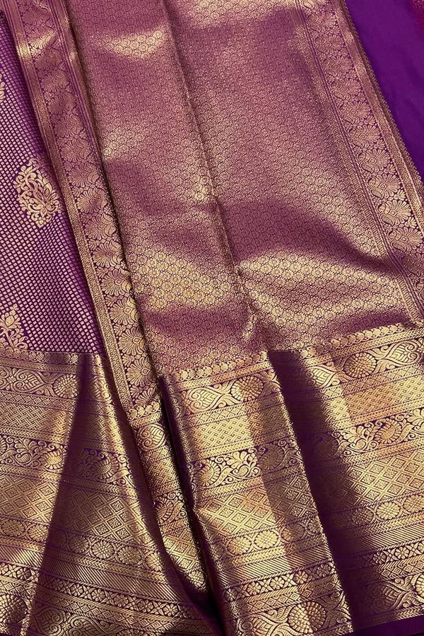 Plum Purple Banarasi Soft Silk Saree with Fine Zari Texture, Gold Buttas and Wide Border  in Surat