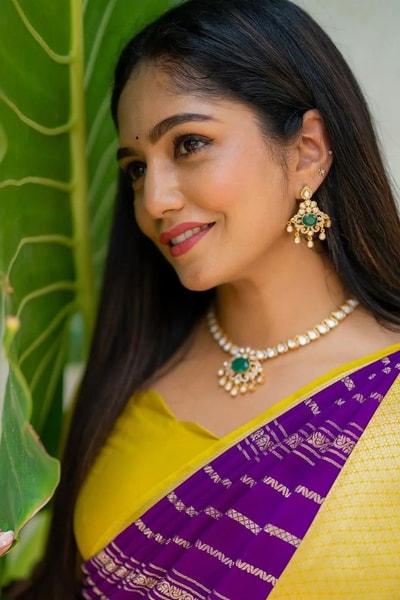 Purple Banarasi Soft Silk Saree with Wavy Zari Stripes and Bright Yellow Contrast Pallu in Surat