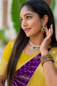 Purple Banarasi Soft Silk Saree with Wavy Zari Stripes and Bright Yellow Contrast Pallu  in Surat