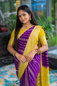 Purple Banarasi Soft Silk Saree with Wavy Zari Stripes and Bright Yellow Contrast Pallu  in Surat