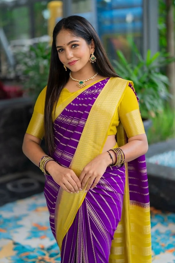 Purple Banarasi Soft Silk Saree with Wavy Zari Stripes and Bright Yellow Contrast Pallu  in Surat
