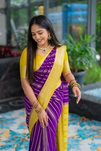 Purple Banarasi Soft Silk Saree with Wavy Zari Stripes and Bright Yellow Contrast Pallu  in Surat