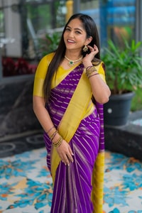 Purple Banarasi Soft Silk Saree with Wavy Zari Stripes and Bright Yellow Contrast Pallu  in Surat
