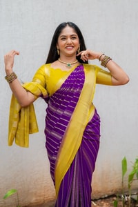 Purple Banarasi Soft Silk Saree with Wavy Zari Stripes and Bright Yellow Contrast Pallu  in Surat