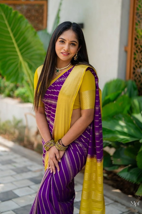 Purple Banarasi Soft Silk Saree with Wavy Zari Stripes and Bright Yellow Contrast Pallu  in Surat