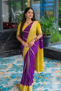 Purple Banarasi Soft Silk Saree with Wavy Zari Stripes and Bright Yellow Contrast Pallu  in Surat