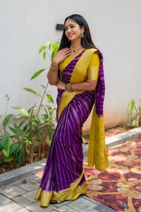 Purple Banarasi Soft Silk Saree with Wavy Zari Stripes and Bright Yellow Contrast Pallu  in Surat