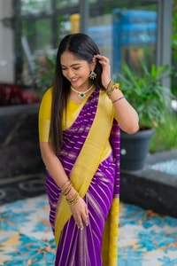 Purple Banarasi Soft Silk Saree with Wavy Zari Stripes and Bright Yellow Contrast Pallu  in Surat