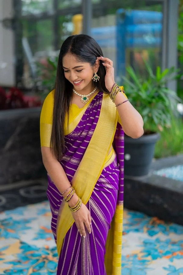 Purple Banarasi Soft Silk Saree with Wavy Zari Stripes and Bright Yellow Contrast Pallu  in Surat