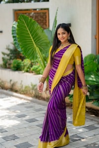 Purple Banarasi Soft Silk Saree with Wavy Zari Stripes and Bright Yellow Contrast Pallu  in Surat