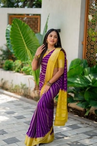 Purple Banarasi Soft Silk Saree with Wavy Zari Stripes and Bright Yellow Contrast Pallu  in Surat