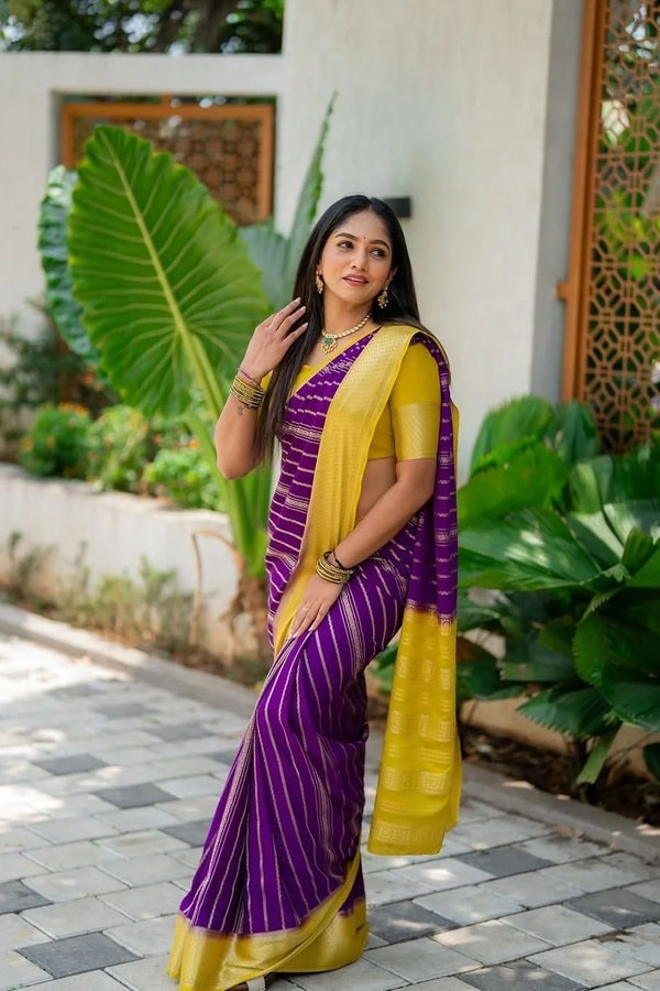 Purple Banarasi Soft Silk Saree with Wavy Zari Stripes and Bright Yellow Contrast Pallu  in Surat