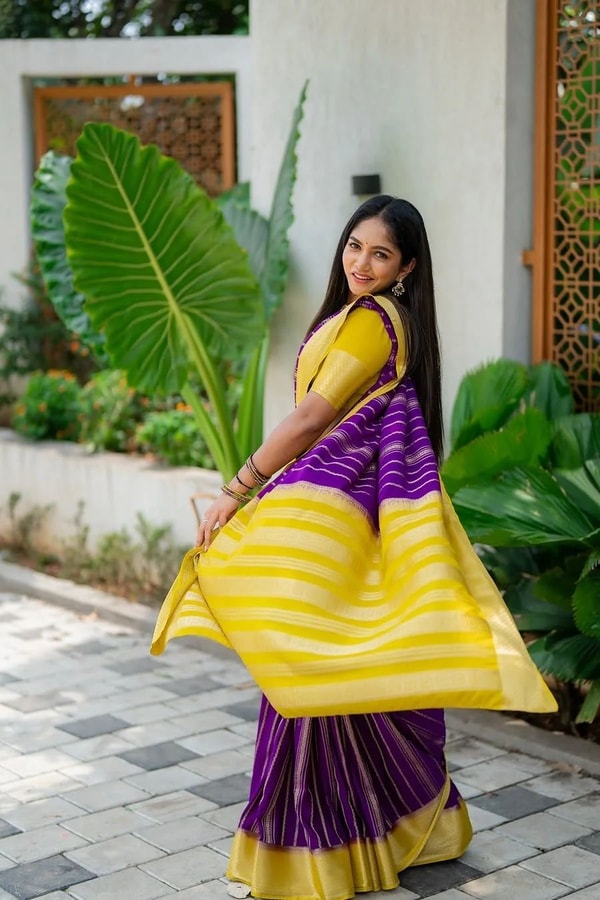 Purple Banarasi Soft Silk Saree with Wavy Zari Stripes and Bright Yellow Contrast Pallu  in Surat
