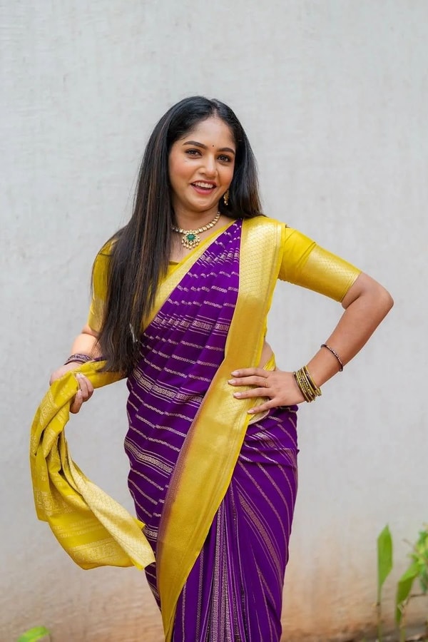 Purple Banarasi Soft Silk Saree with Wavy Zari Stripes and Bright Yellow Contrast Pallu  in Surat