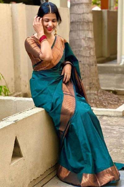 Radiant Elegance Enhance Your Look With Stunning Silk Sarees and Golden Jewelry in Surat