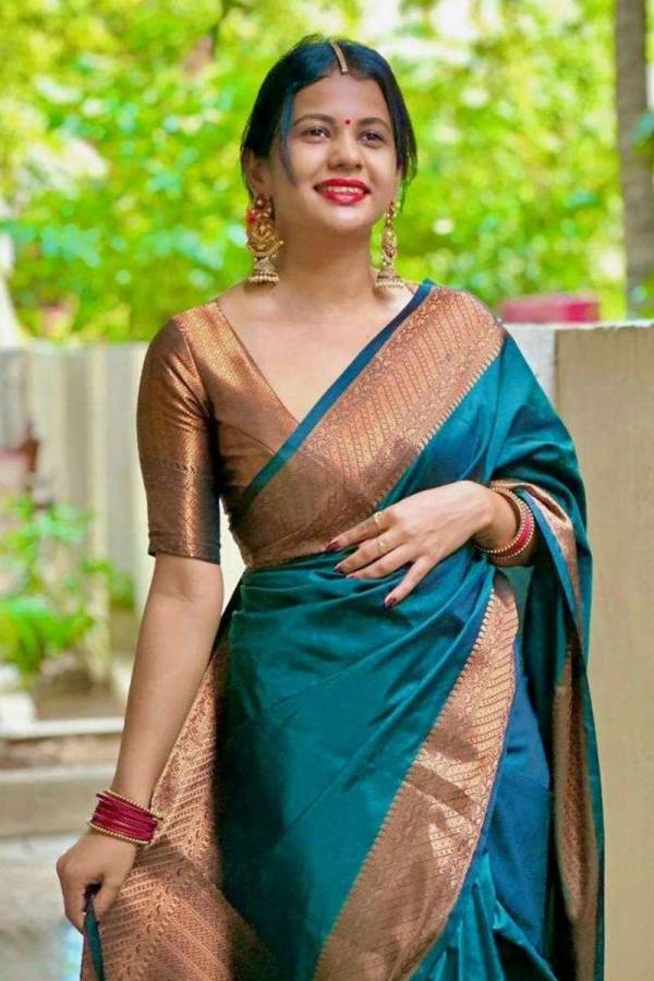 Radiant Elegance Enhance Your Look With Stunning Silk Sarees and Golden Jewelry  in Surat