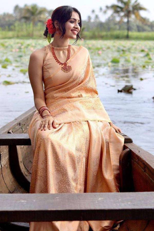 Radiate Elegance on Your Special Day With Our Captivating Banarasi Silk Sarees  in Surat