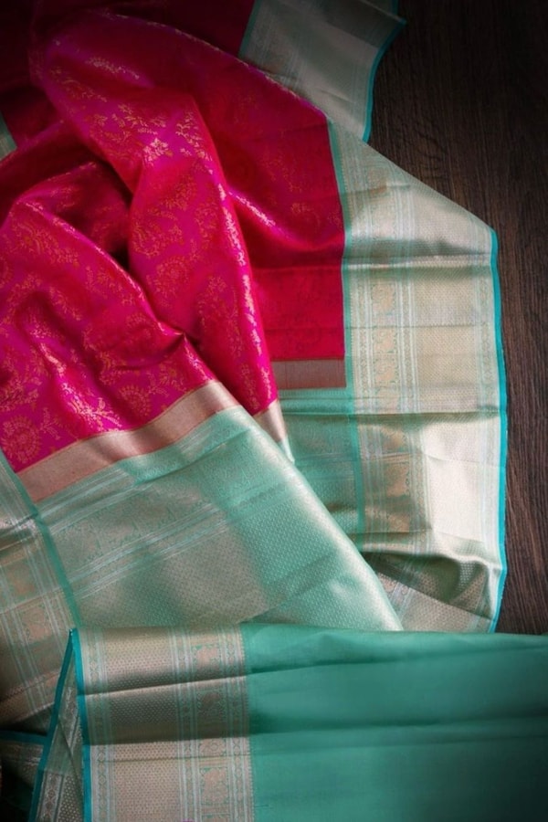 Rani Pink Banarasi Soft Silk Saree with Contrast Silver Tissue Border and Sea Green Edge  in Surat