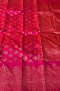Rani Pink Banarasi Soft Silk Saree with Copper Zari Diamond Buttas and Temple Motif Border  in Surat