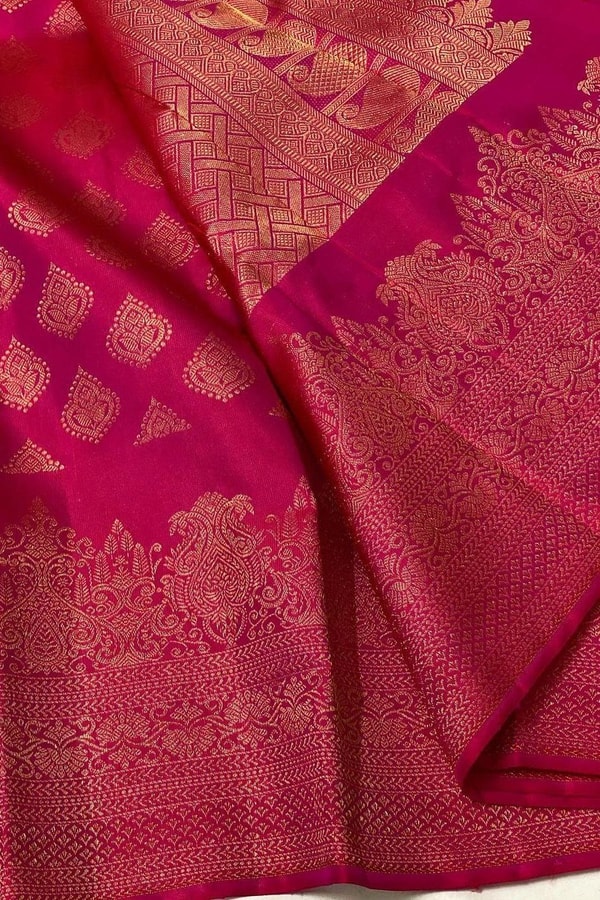 Rani Pink Banarasi Soft Silk Saree with Copper Zari Diamond Buttas and Temple Motif Border  in Surat