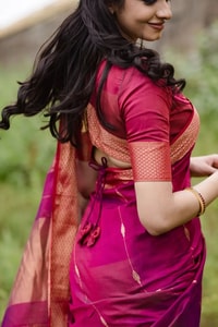 Rani Pink Saree with Contrast Peach-Orange Zari Border and Pallu and Delicate Buttis  in Surat