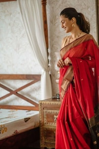Red Saree with Contrast Black Pallu, Gold Zari Buttas and Woven Gold Border  in Surat