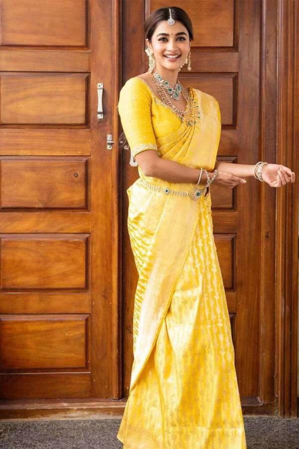 Rich Pallu and Heavy Golden Zari Weaving on an Elegant Allover Flower Design  in Surat