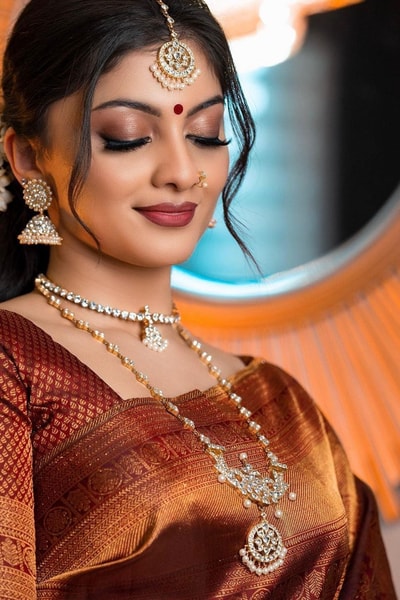 Rust Copper Banarasi Soft Silk Saree with All-Over Copper Zari Weave and Striped Pallu in Surat