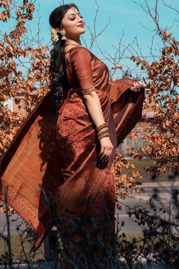 Rust Copper Banarasi Soft Silk Saree with All-Over Copper Zari Weave and Striped Pallu  in Surat