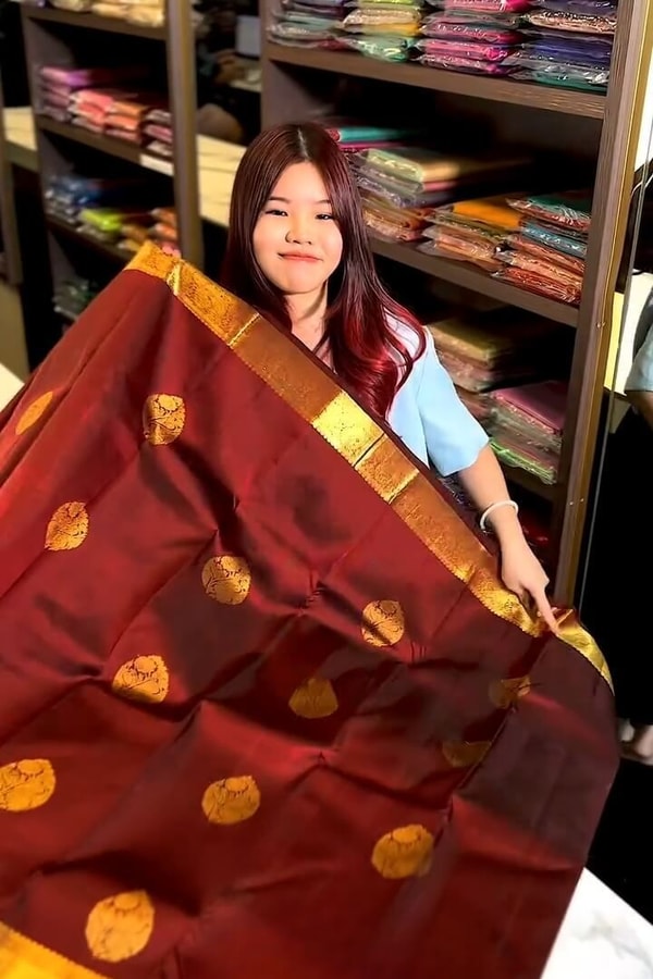 Rust Maroon Banarasi Soft Silk Saree with Gold Coin Buttis and Mustard Zari Border  in Surat