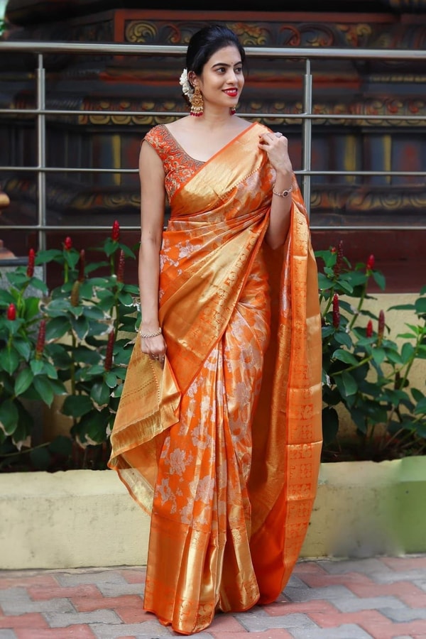 Saffron Orange Banarasi Soft Silk Saree with All-Over Zari Floral Jacquard Weave  in Surat