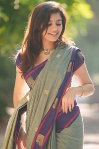 Sage Green Saree with Purple Contrast Border, Zari Butis and Tasselled Pallu  in Surat