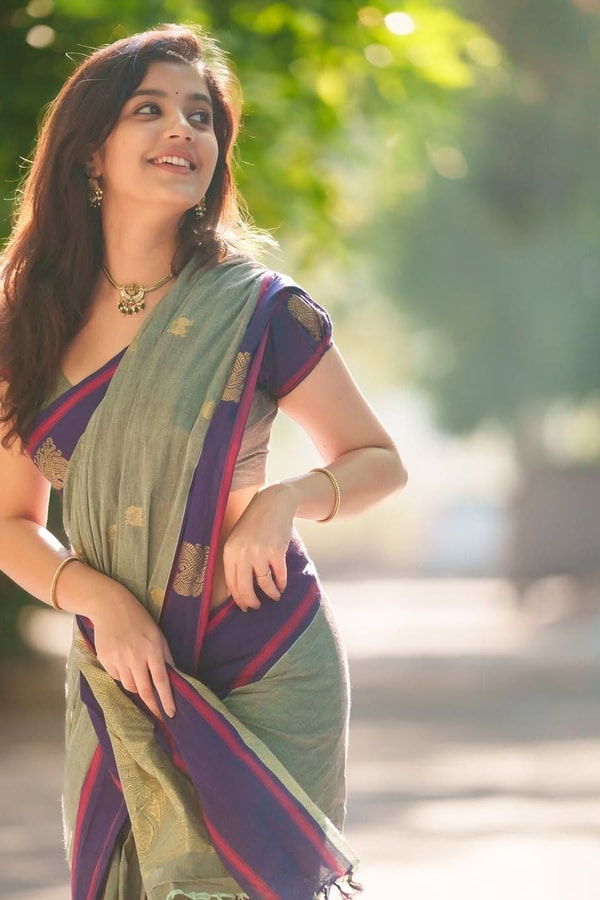 Sage Green Saree with Purple Contrast Border, Zari Butis and Tasselled Pallu  in Surat