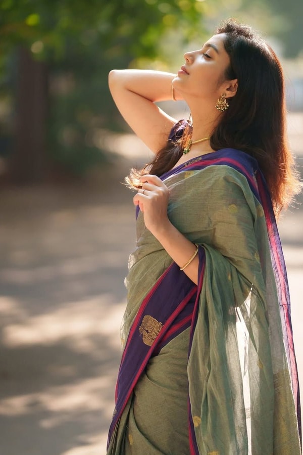 Sage Green Saree with Purple Contrast Border, Zari Butis and Tasselled Pallu  in Surat