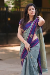 Sage Green Saree with Purple Contrast Border, Zari Butis and Tasselled Pallu  in Surat