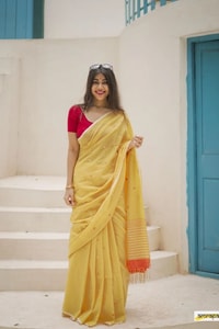 Sunshine Yellow Linen-Look Soft Cotton Saree with Fine Stripes and Red Tassel Pallu  in Surat