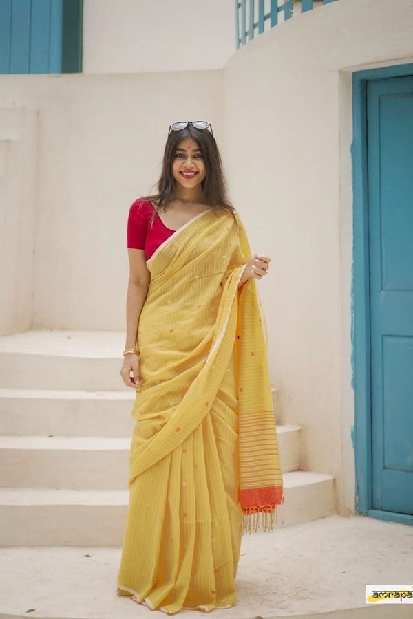 Sunshine Yellow Linen-Look Soft Cotton Saree with Fine Stripes and Red Tassel Pallu  in Surat