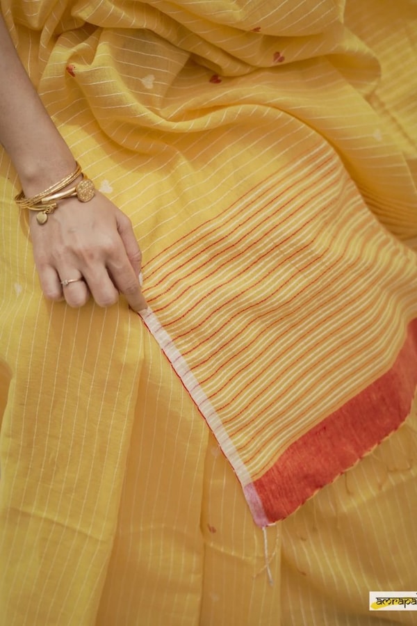 Sunshine Yellow Linen-Look Soft Cotton Saree with Fine Stripes and Red Tassel Pallu  in Surat