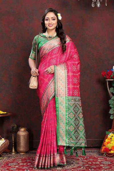 Tassels and Tradition Finishing Touches on Patola Silk with Meenakari in Surat
