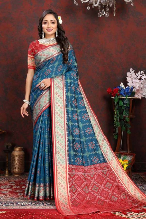 Tassels and Tradition Finishing Touches on Patola Silk with Meenakari  in Surat