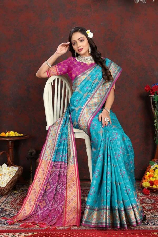 Tassels and Tradition Finishing Touches on Patola Silk with Meenakari  in Surat