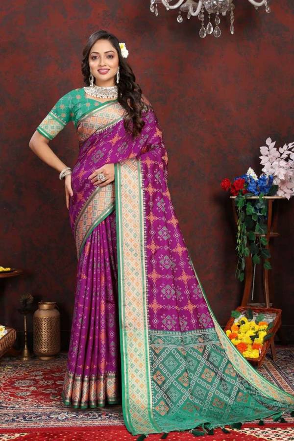Tassels and Tradition Finishing Touches on Patola Silk with Meenakari  in Surat