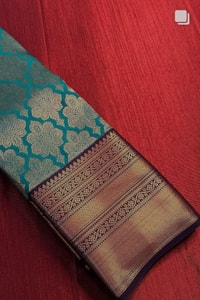 Teal Blue Banarasi Soft Silk Saree with Copper Zari Brocade Jaal and Heavy Woven Border  in Surat